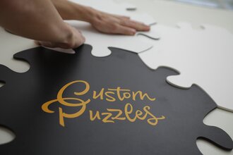 Endlospuzzleteile mit Logoaufdruck